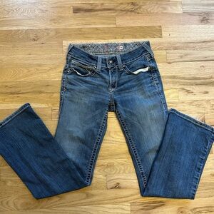 Ladies Ariat bootcut mid rise jeans.